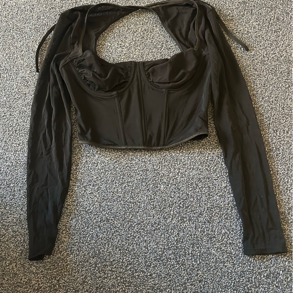 Black going out top